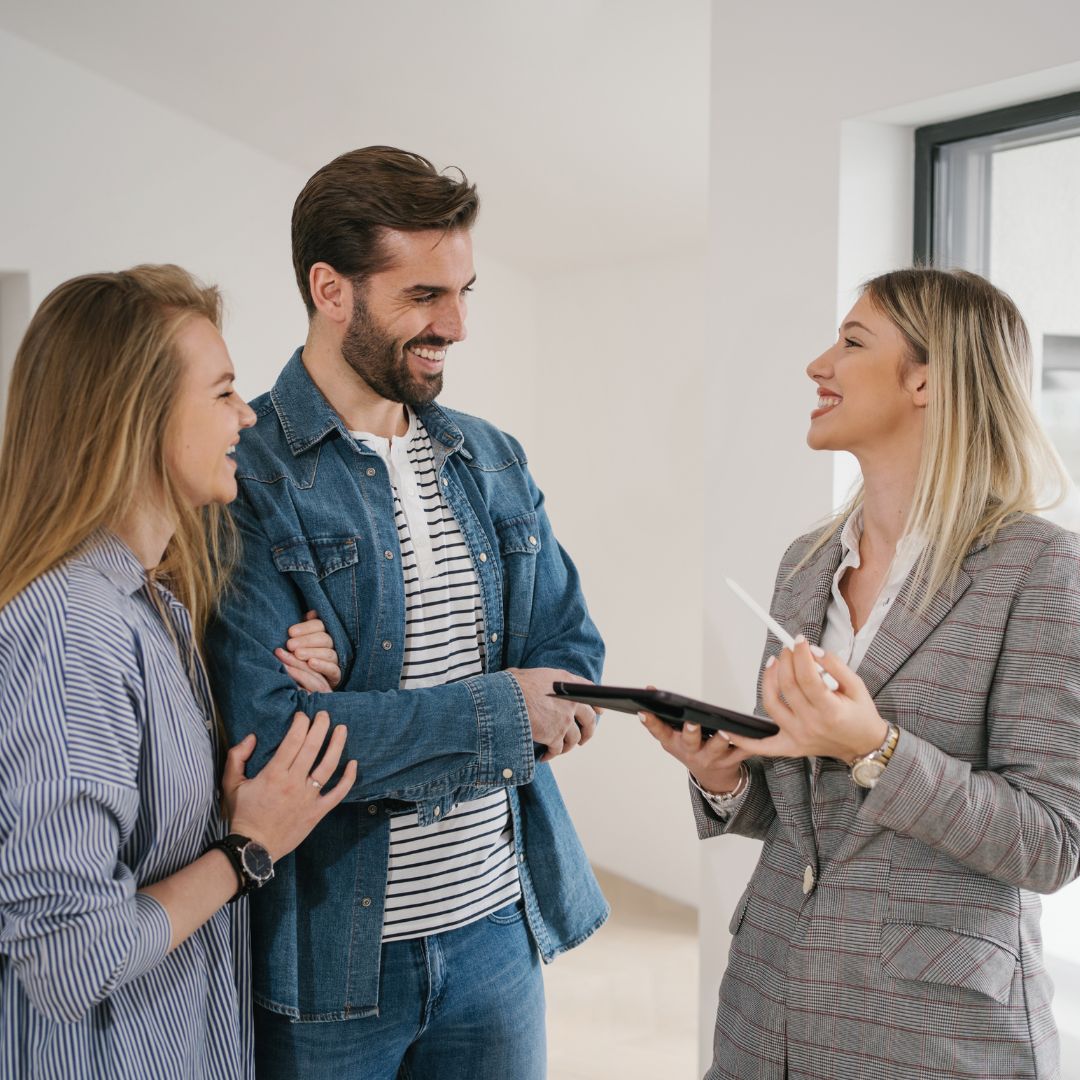 A real estate agent with a couple