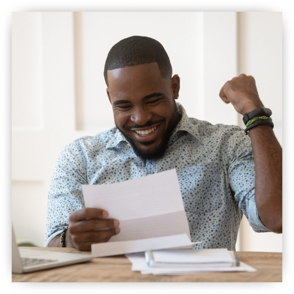 Man celebrating getting pre-approved