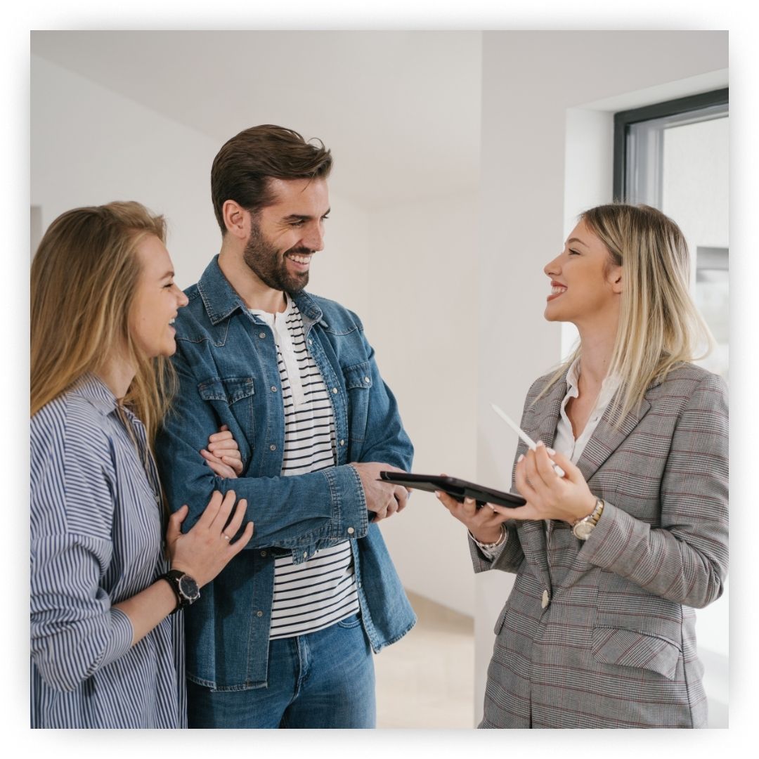 real estate agent with clients