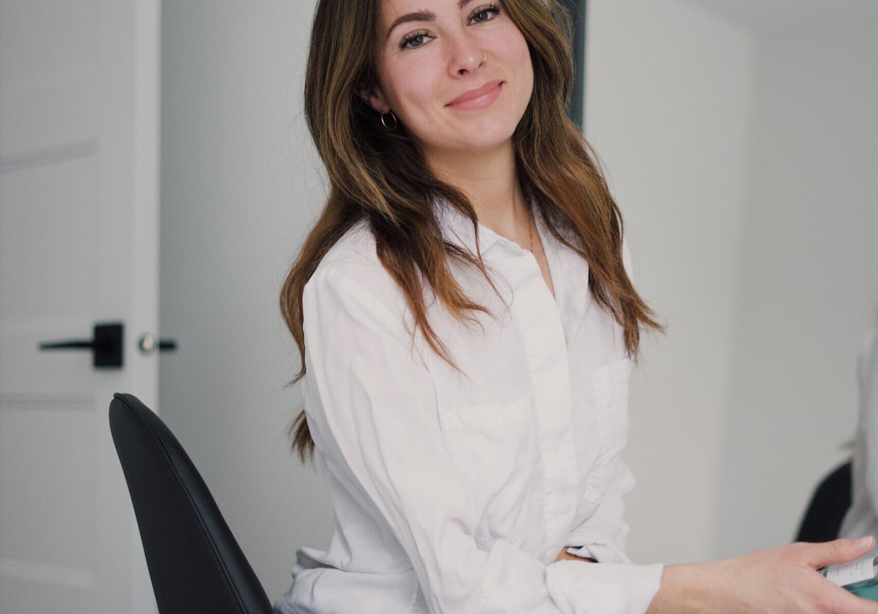 image of a pleased woman who is a real estate agent.